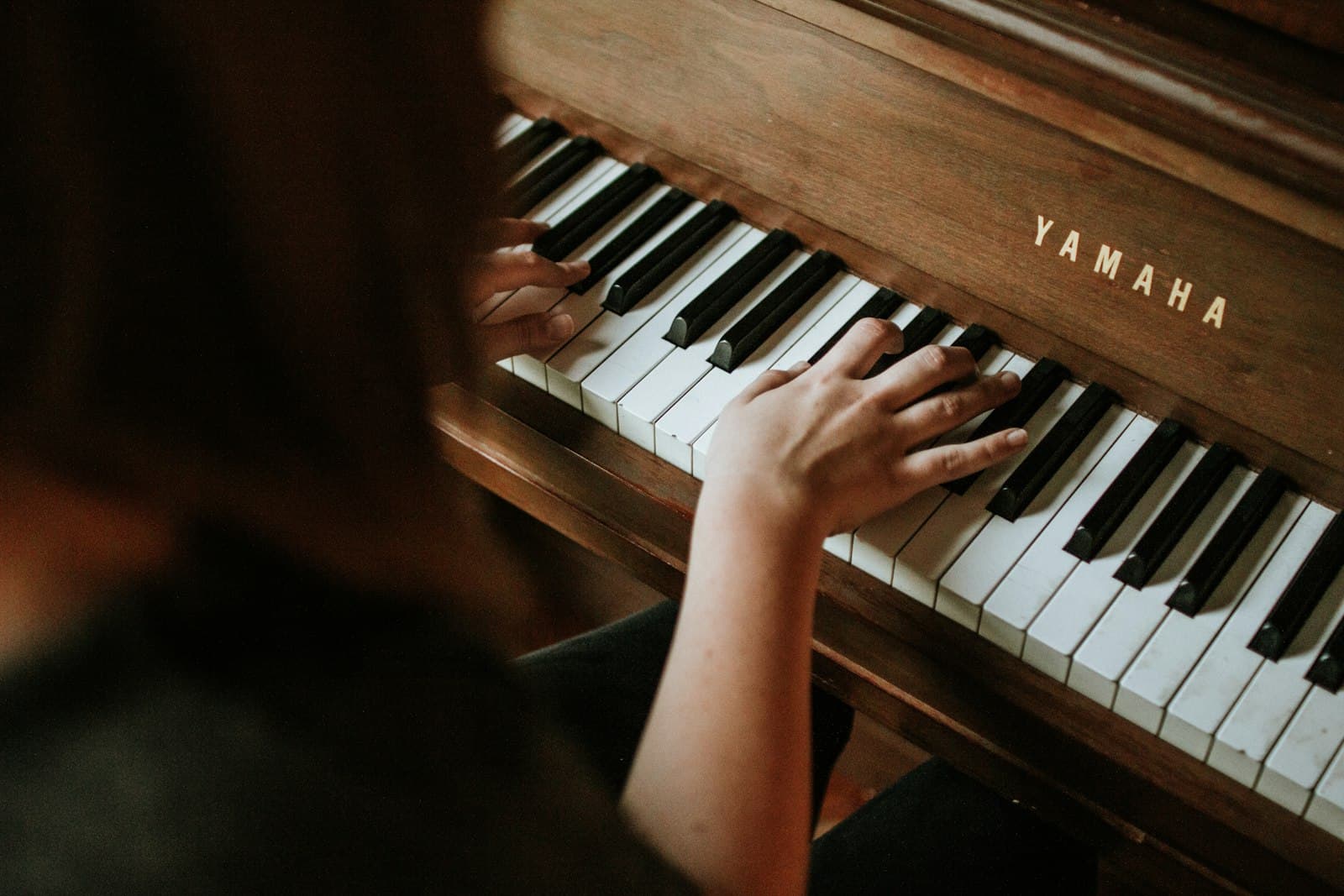 Nina Solnzeva writing at the piano